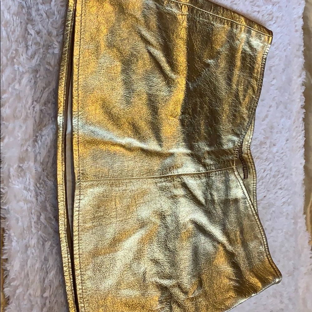 Gold mini skirt